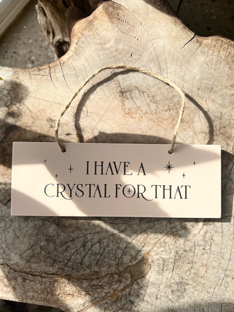 I have a crystal for that - hanging wooden sign
