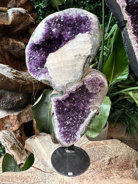 Large Amethyst with calcite on a stand
