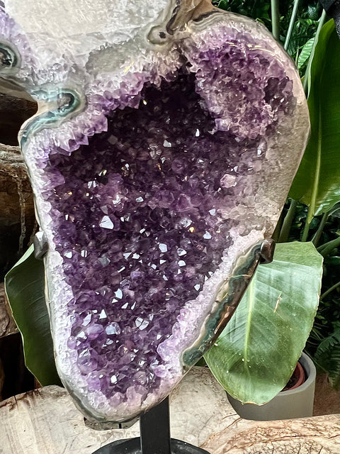 Large Amethyst with calcite on a stand