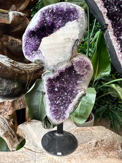 Large Amethyst with calcite on a stand