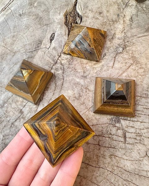 Tigers eye pyramid carving
