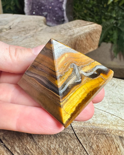 Tigers eye pyramid carving