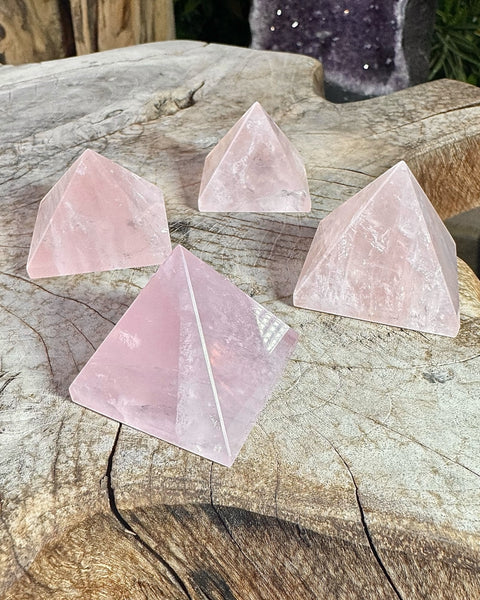 Rose quartz pyramid carving