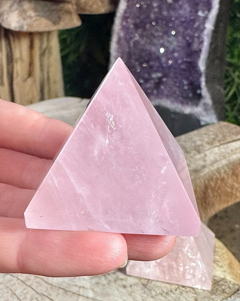 Rose quartz pyramid carving