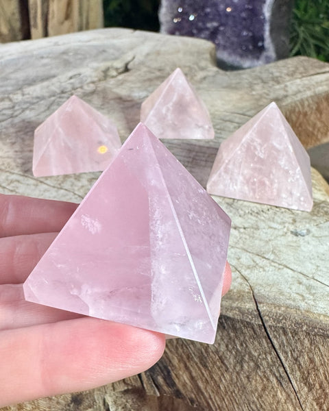 Rose quartz pyramid carving