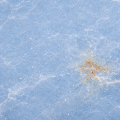 Angelite spheres on white background