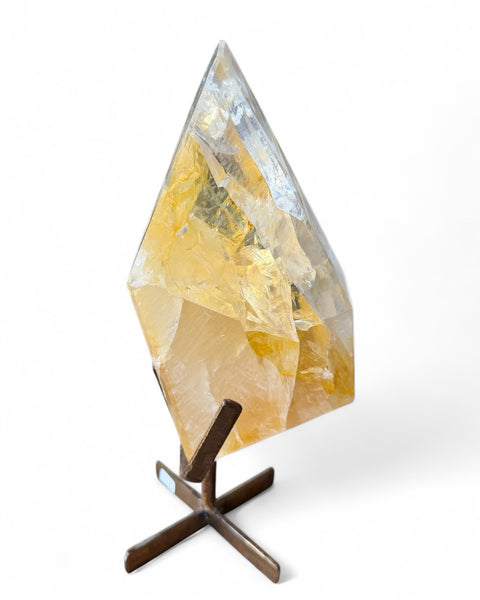 Polished golden healer quartz on stand