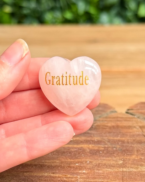 Rose quartz hearts with words