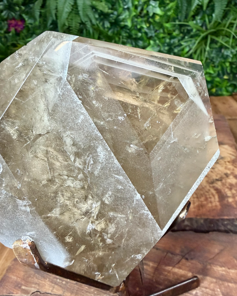 Faceted citrine on stand with lodalite phantom