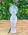 mother Mary rose quartz carving with green background