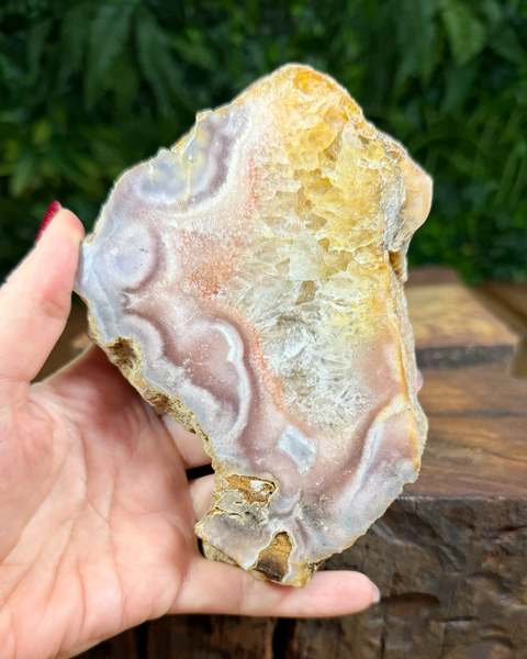 Pink amethyst slab on stand