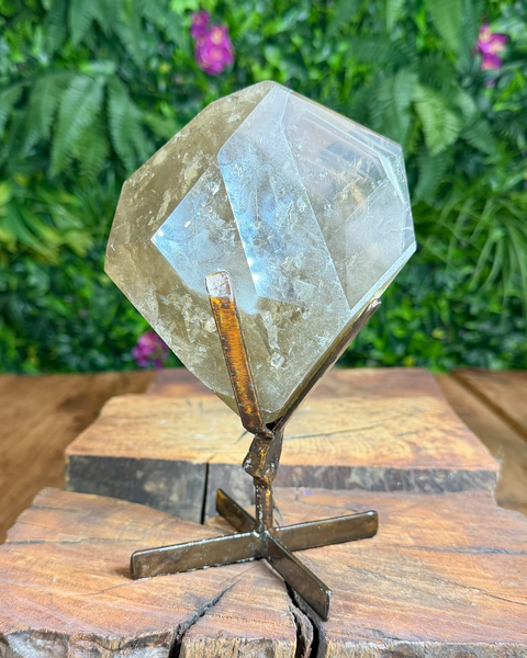Faceted citrine on stand with lodalite phantom