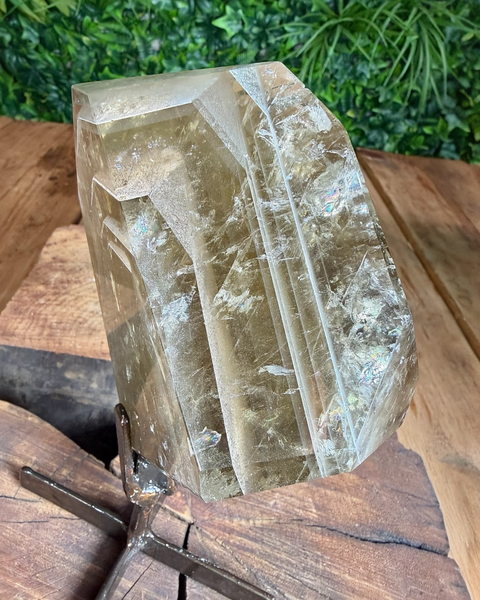 Faceted citrine on stand with lodalite phantom