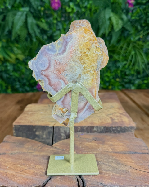 Pink amethyst slab on stand