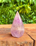 amethyst flame carving on wood stand