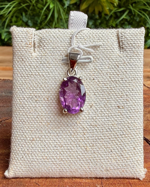 Faceted amethyst pendant in sterling silver - oval cut