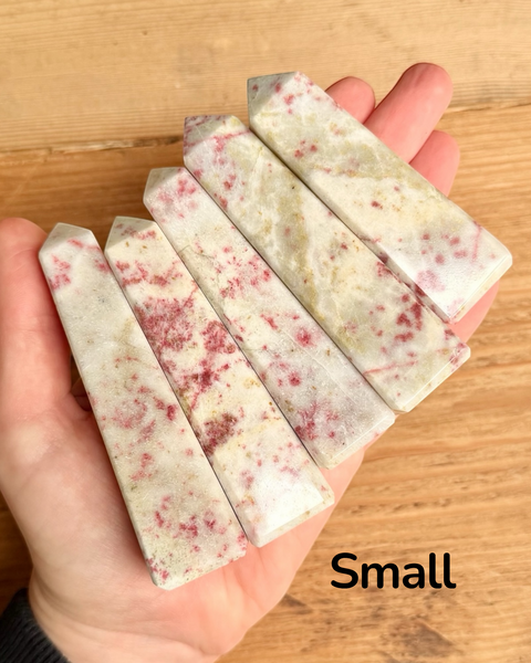 hand holding small cinnabrite towers