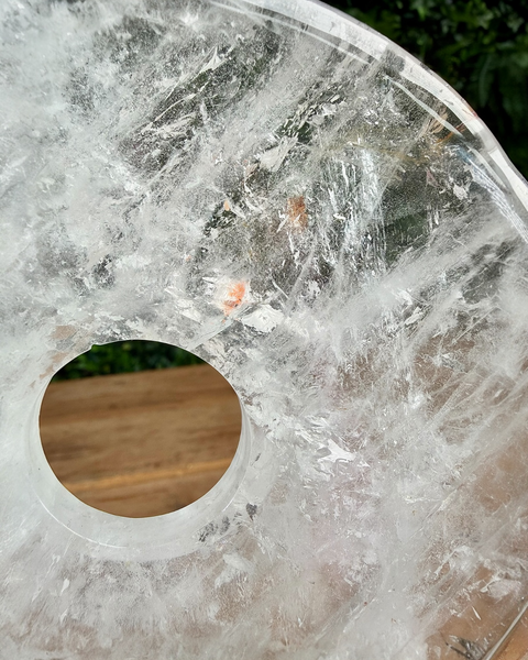 close up of a clear quartz doughnut
