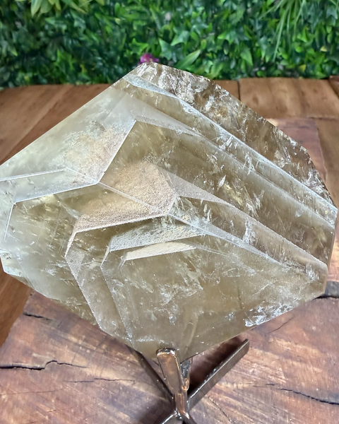 Faceted citrine on stand with lodalite phantom