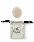 Rose quartz crystal thumb worry stone with Feel Good Crystals drawstring pouch
