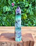 Large fluorite tower with green & purples bands 