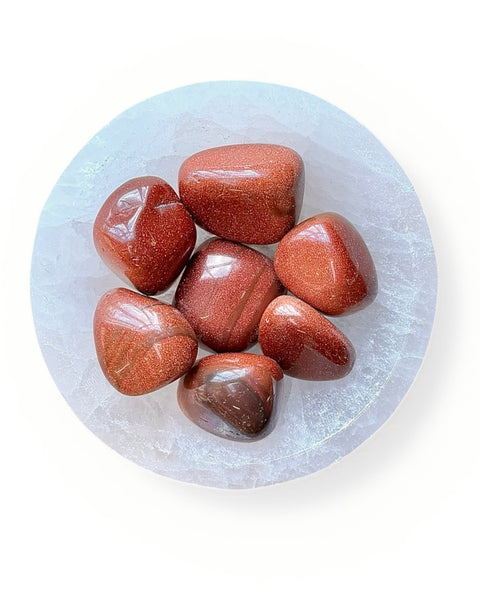 goldstone tumble stones in a bowl
