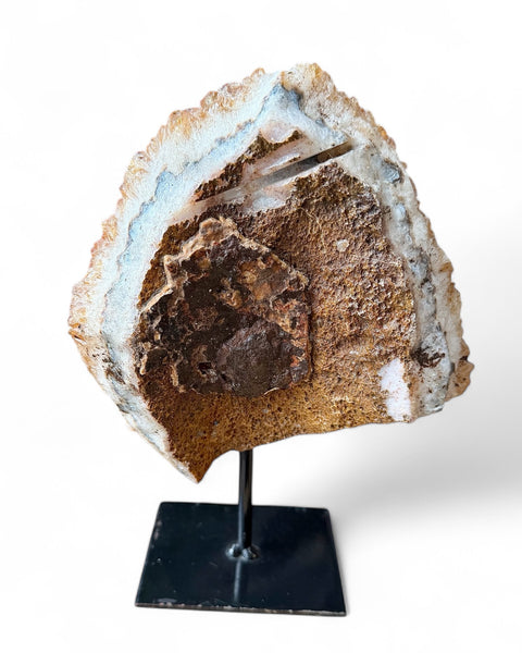 Heat treated citrine crystal on stand