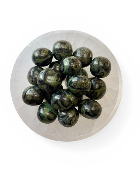 kambaba jasper tumble stone in a bowl