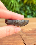 side view of a labradorite carving