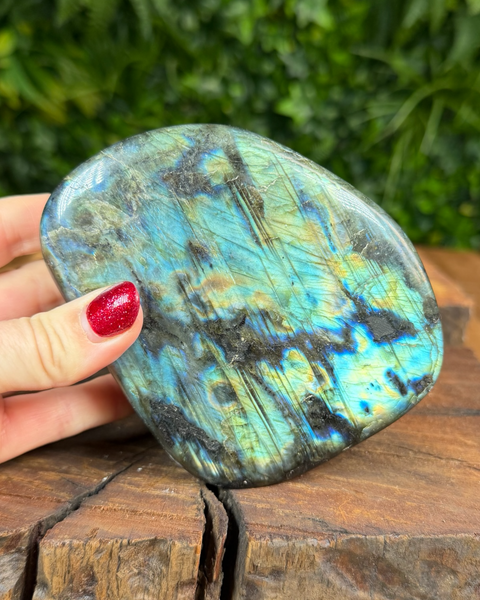 Labradorite freeform crystal glowing with multicolour light
