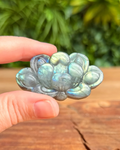 labradorite crystal carving with green and blue flashes
