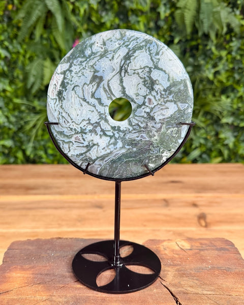 Moss agate Bi carving on black stand
