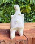 elephant carving on a wooden stand