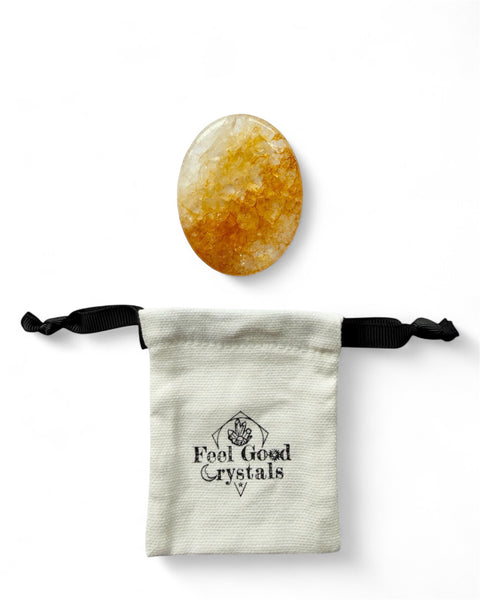 Golden healer quartz crystal thumb worry stone with Feel Good Crystals drawstring pouch