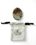 Bloodstone crystal thumb worry stone with Feel Good Crystals pouch