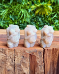 three pregnant lady carvings in moonstone