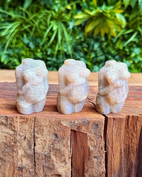 three pregnant lady carvings in moonstone