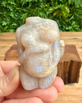 Pregnant body carving in moonstone
