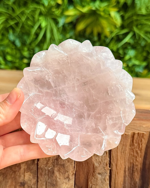 bowl made out of rose quartz in lotus flower shape