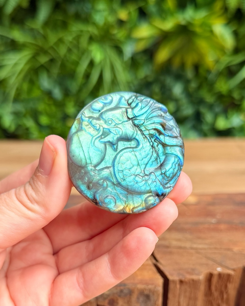labradorite dragon carving with green and blue flash