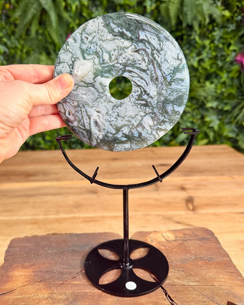 Moss agate bi carving with hole in middle