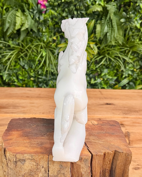 back view of white jade horse carving